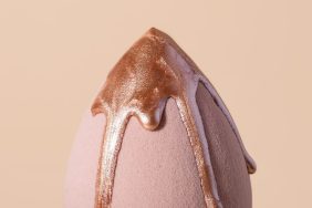 Beauty blender with dripping bronzer on it